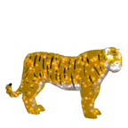 A glittery golden tiger-shaped light decoration with black stripes and white accents.