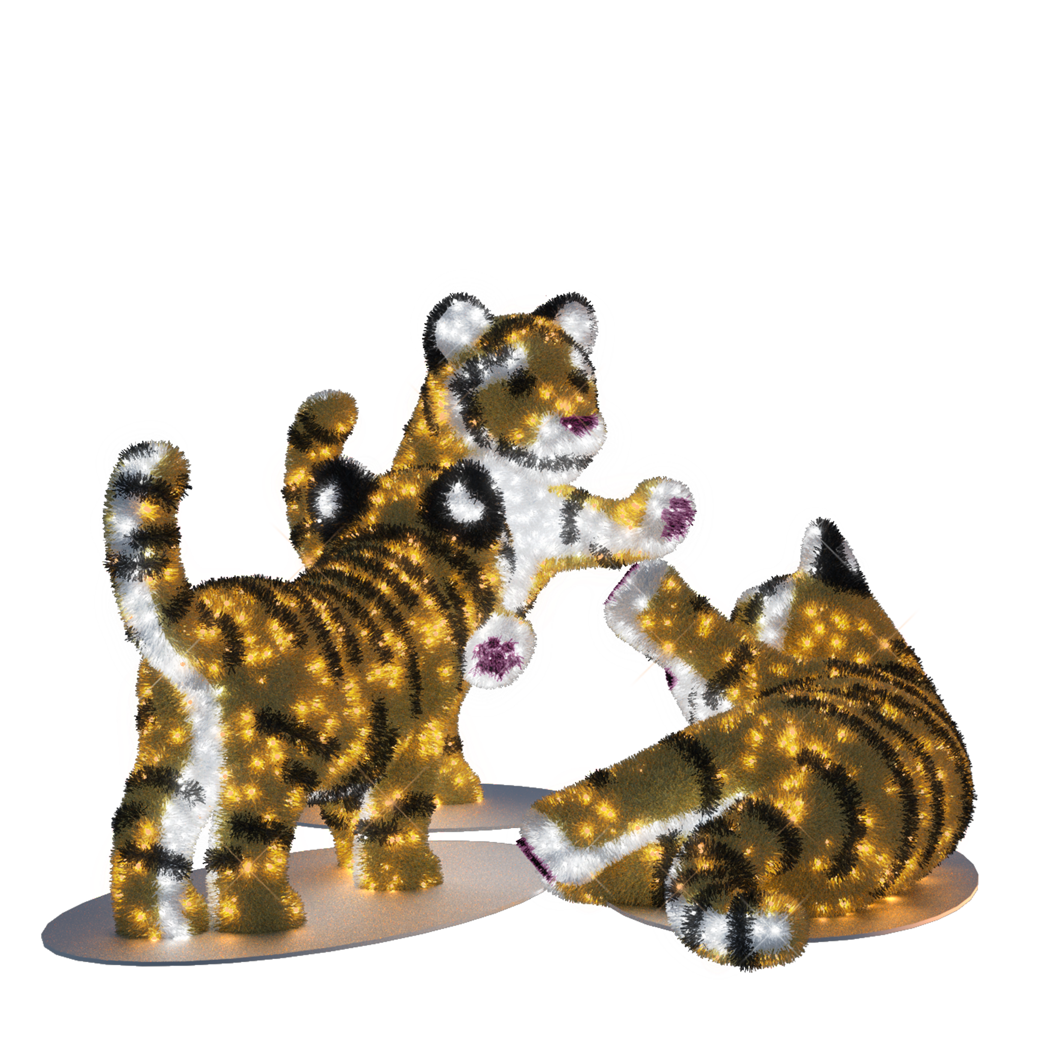 three illuminated tiger cubs
