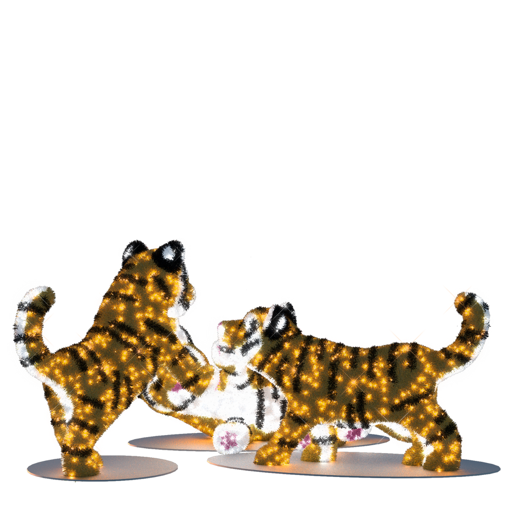 Three illuminated tiger-shaped light sculptures with warm and pure white glowing lights, perfect for zoo displays
